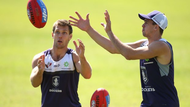 Gearing up for the Swans: Dockers Matt de Boer and Stephen Hill at a training session.