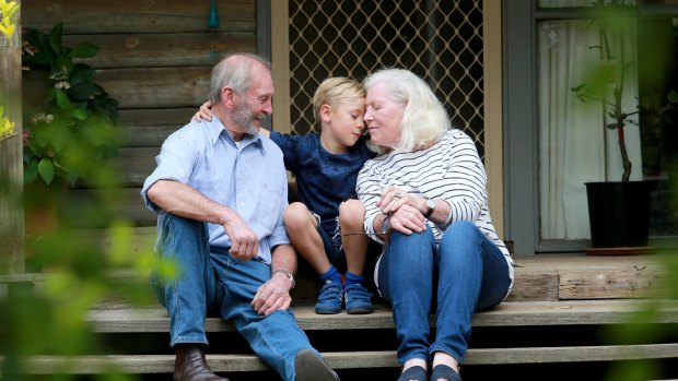 Christine and John Snelling with their grandson, six-year-old Cassius.