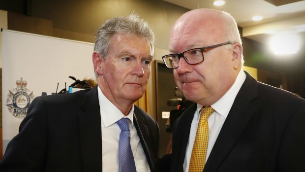 ASIO Director-General of Security Duncan Lewis and Attorney-General Senator George Brandis at the National Press Club of Australia in Canberra in May.