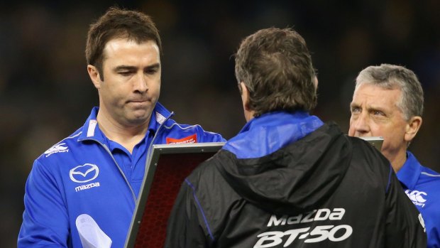Questions: Brad Scott during the game against Richmond on Friday.