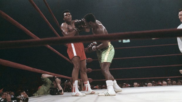 Muhammad Ali, left, and Joe Frazier in action at Madison Square Garden, New York, in March 1971. 