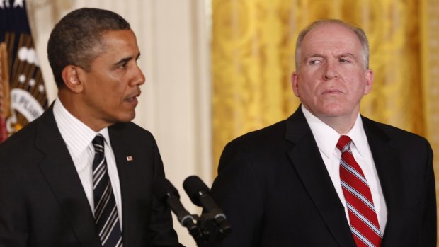 Barack Obama with former White House counterterrorism advisor John O. Brennan, right, as the president nominates him to become the next CIA chief in 2013.