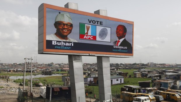 An electronic billboard promoting opposition presidential candidate Muhammadu Buhari and his running mate, Yemi Osinbajo, in Lagos.