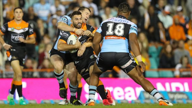James Tedesco is tackled during the Tigers game against Cronulla on April 29.