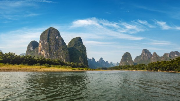 Banyan Tree Yangshuo lies among stunning karst peaks. 