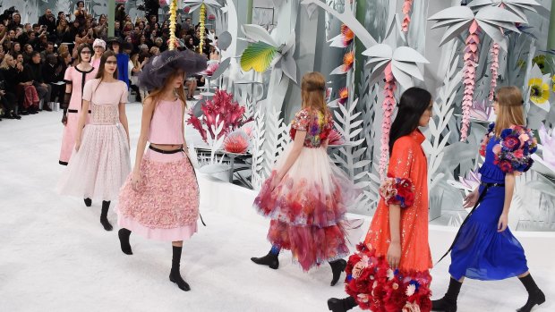 Models on the catwalk at a 2015 Chanel show in Paris. There are "new girls" every season, says modelling "veteran", 19-year-old Binx Walton.