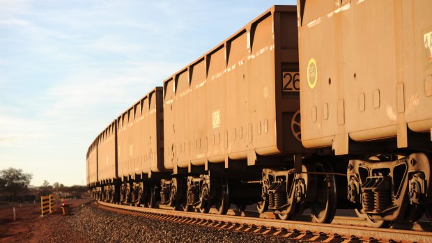 A train as it is being loaded with iron ore to be transported to the company's Port Hedland facility for export.
