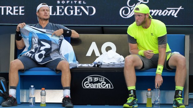 Over and out: The loss brought to an end the career of Sam Groth (right).