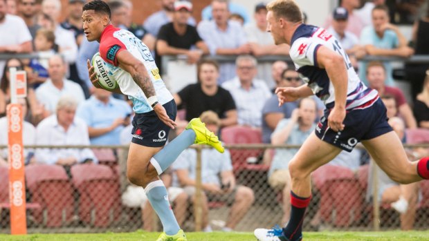 Too quick: Israel Folau outpaces Reece Hodge.