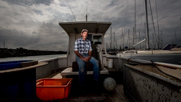 Commercial fishermen Dugga Beazley on his boat at St Kilda.