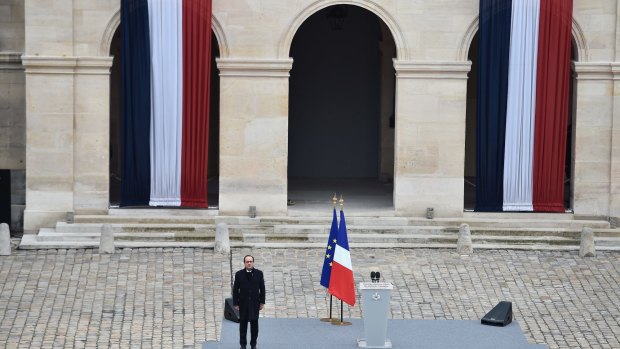 French President Francois Hollande attends a tribute to the terror attack victims at Les Invalides on November 27.