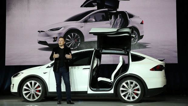 Electric car pioneer Elon Musk's Tesla continues to hit roadblocks, but is about to go mass market.