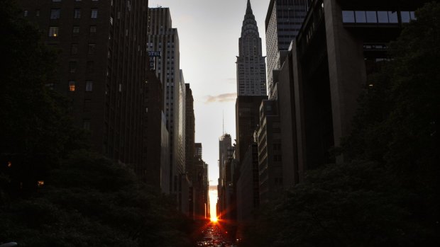 The sun shines down 42nd Street during 'Manhattan Henge.'