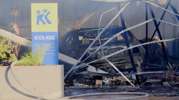 A car has ploughed into a childcare centre in Tarneit, destroying the building and killing the driver.