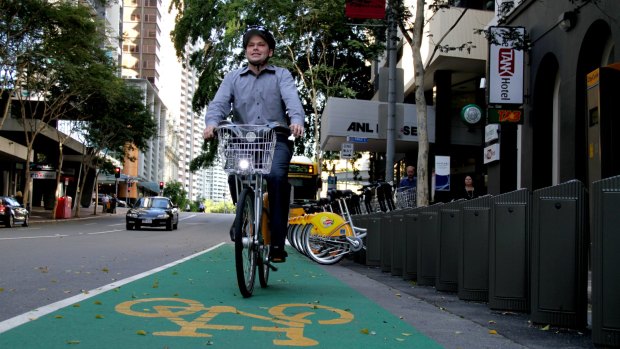 Public transport boss Adrian Schrinner says Brisbane' could benefit from voluntary helmet laws.