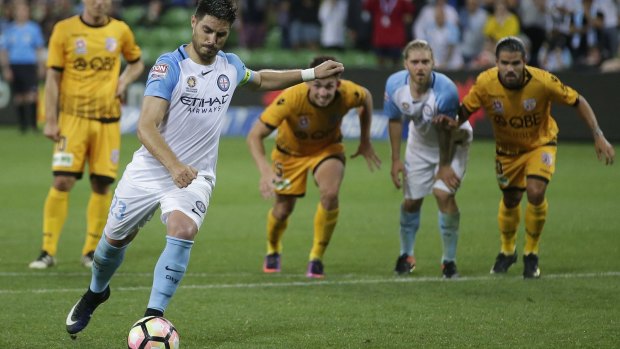 Melbourne City skipper Bruno Fornaroli takes a penalty against Perth Glory at AAMI Park on Tuesday night.