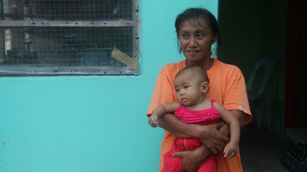 Baby Sofia Deximo, seen here with her grandmother Rosa, was born four days after Haiyan struck.