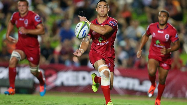 Modest beginning: Duncan Paia'aua attempts to ignite the attack during the Super Rugby trial match between the Queensland Reds and the Melbourne Rebels at Barlow Park in Cairns.