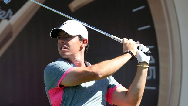 Rory McIlroy watches his tee shot on the seventh hole during the third round of the Dubai Desert Classic.