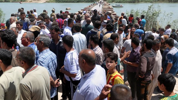 Displaced Iraqis from Ramadi on Saturday. 