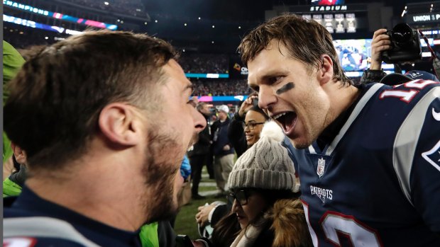 Danny Amendola, left, and quarterback Tom Brady celebrate the Patriots' victory.