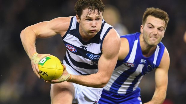 Clearance king: Dangerfield drives the Cats into attack again in a faultless performance on Saturday night. 