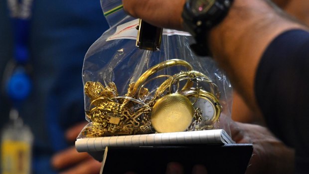 Suspected stolen gold found on a customer when Gold Buyers Melbourne was raided by the police.