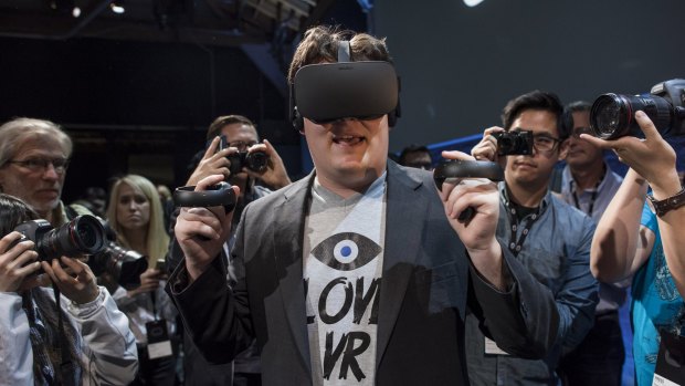 Palmer Luckey demonstrates the Oculus VR headset.