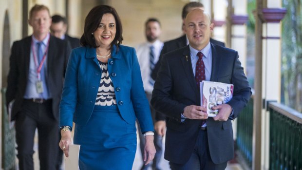 Queensland Premier Annastacia Palaszczuk and Treasurer Curtis Pitt deliver the budget.