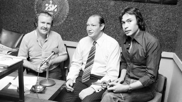 Multimedia star: Mike Gibson and radio show co-host George Moore with Kerry Packer at 2SM on 7 November 1977.  
