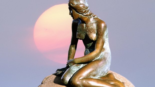 The original Little Mermaid statue in Copenhagen harbour by Edvard Eriksen.