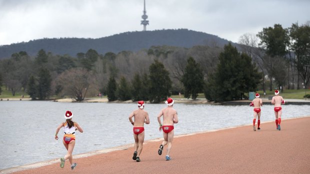 Participants in the 2015 Cystic Fibrosis ACT Santa Speedo Shuffle. 