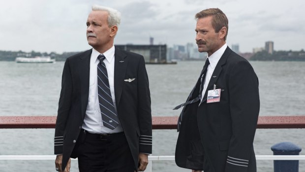 Tom Hanks, left, and Aaron Eckhart in <i>Sully</i>.