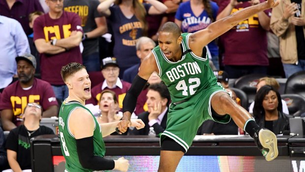 Ecstatic Celtics: Al Horford celebrates with Jonas Jerebko.