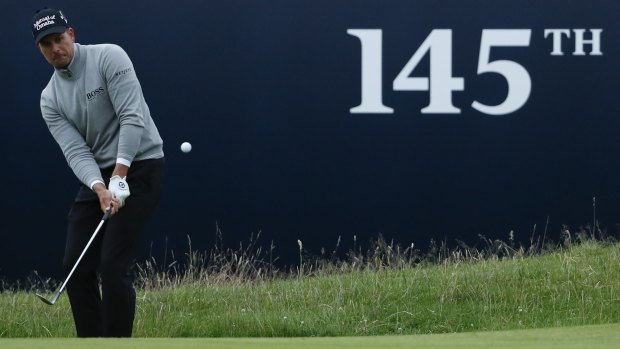 Chipping away: Henrik Stenson on the 18th.