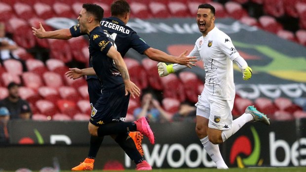 Delight: The Mariners celebrate a goal during the round-six A-League match against the Newcastle Jets.