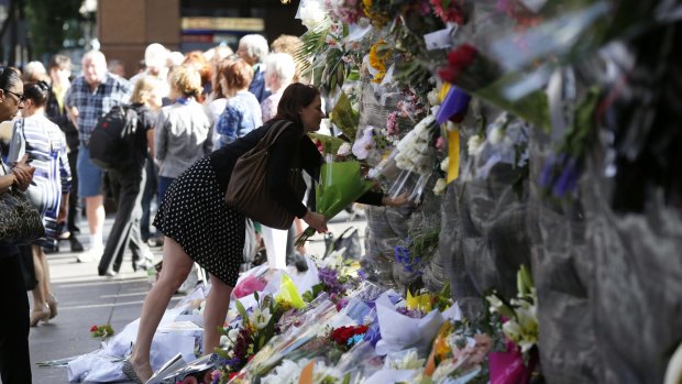 Remembering victims: Floral tributes continued to be left at Martin Place on Wednesday.