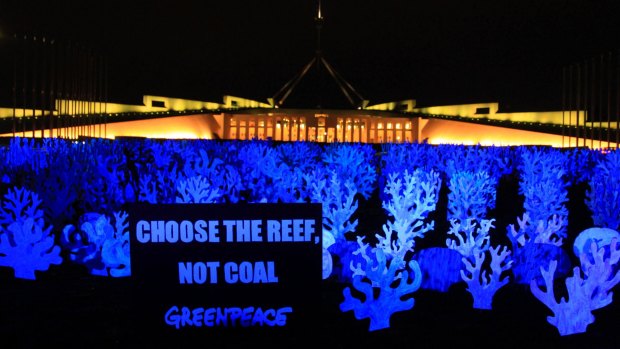 The activists are urging politicians to choose the Great Barrier Reef over the coal industry.