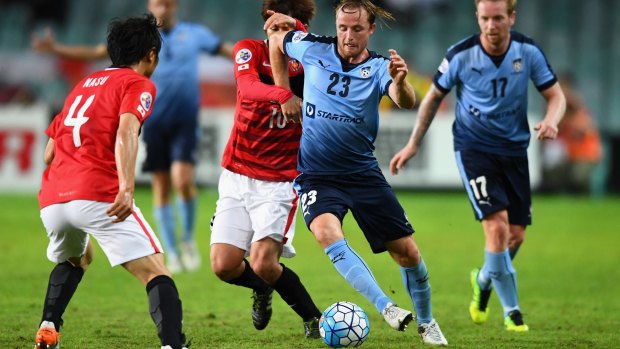 Rhyan Grant of Sydney FC takes on the Urawa Red Diamonds defence at their Asian Champions League clash last month.