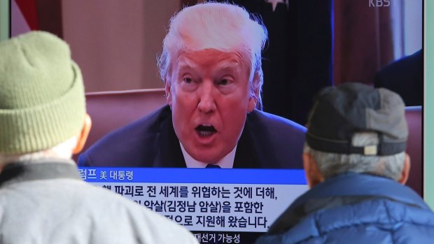 A TV screen shows Donald Trump at the Seoul Railway Station in Seoul, South Korea after he put North Korea back on the anti-terror watch list.