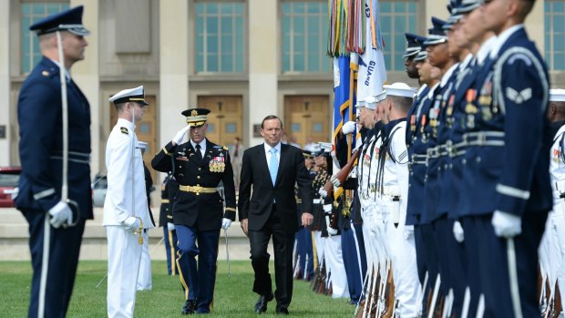 Prime Minister Tony Abbott received full military honours during his visit to the US Pentagon a year ago.