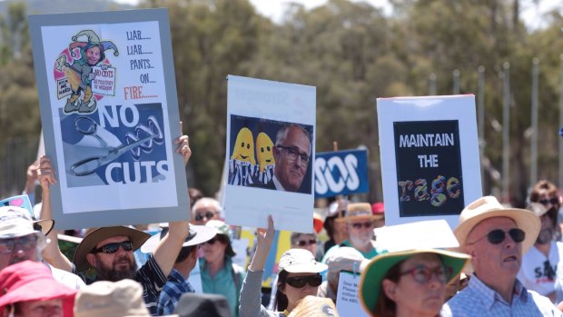 Protesters rally against ABC budget cuts outside Parliament House on Tuesday.