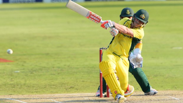 Big hitter: Australia's David Warner shows the power in his bat in a Twenty20 match against South Africa.