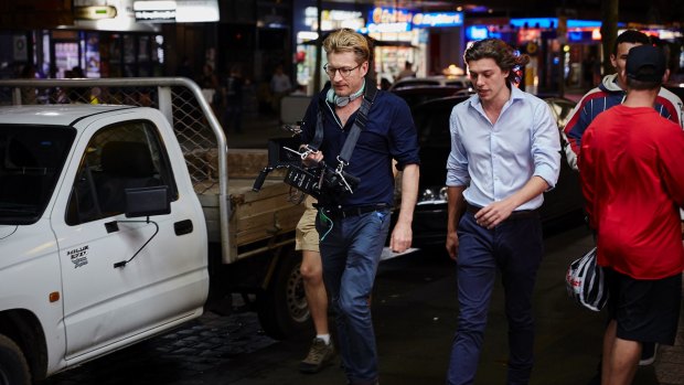 David Wenham (left, with camera) and Benedict Samuel in Kings Cross during the filming of  Ellipsis.