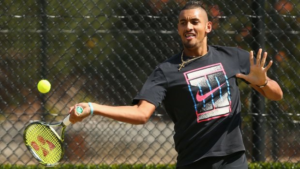 Recovering: Nick Kyrgios plays a forehand during a practice session at Kooyong on Wednesday.