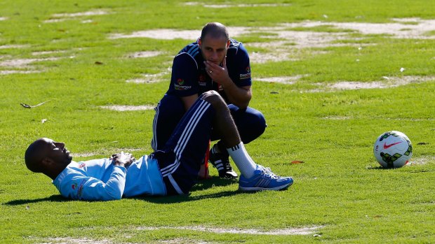 Still not 100 per cent: Sydney FC midfielder Mickael Tavares stretches at training on Thursday.