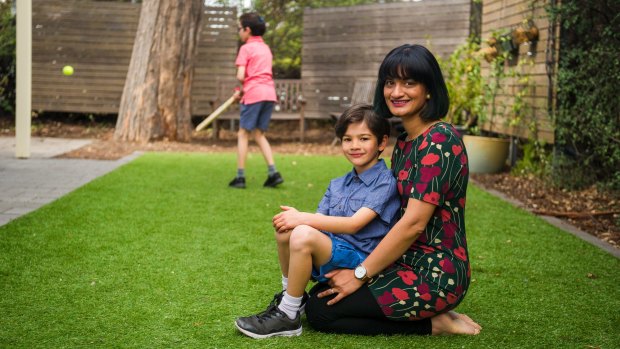Concerned: Aarthi Ayyar-Biddle with her seven-year-old son Sujaan in Canberra.  