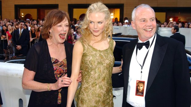 Close-knit: Nicole Kidman, centre, with her mother Janelle and father Antony, who died in 2014.