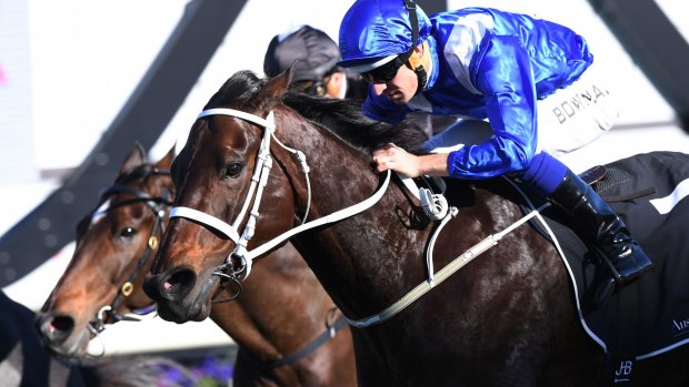 Ears back: Winx edges Foxplay in the Warwick Stakes.