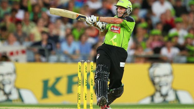 Winning feeling: Mike Hussey plays a pull shot for the Sydney Thunder last season. 